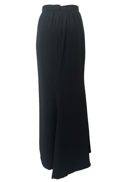 Back view of 1990s vintage black silk maxi evening skirt with train by Fernando Pena, size extra small to small.