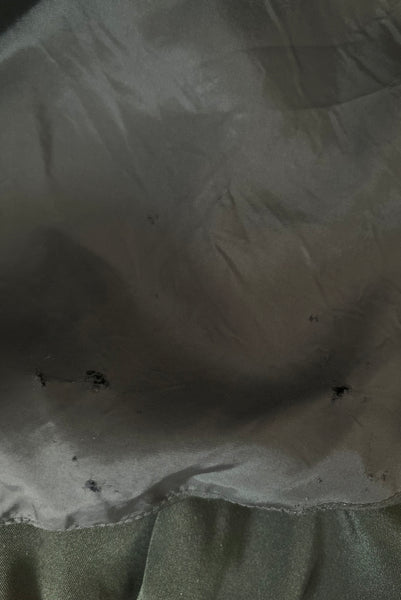 Interior detail view of 1990s vintage black silk maxi evening skirt with train by Fernando Pena, size extra small to small. Showing damage to the lining of the train.