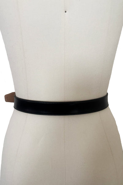 Back view of 1990s vintage black leather and gold chain buckle designer belt by Ellen Tracy, size extra small to small.