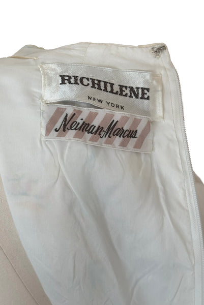 Interior detail view of 1960s vintage white chiffon, satin polka dot, yellow and green lily of the valley print floral maxi dress by Richilene New York for Neiman Marcus, size small to medium. Showing the Richilene New York & Neiman Marcus labels, and white synthetic lining.