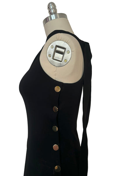 Detail view of 2000s vintage y2k Derek Lam 10 Crosby black knit one shoulder asymmetrical dress with gold buttons, size small to medium. Showing the large gold metal button closure.