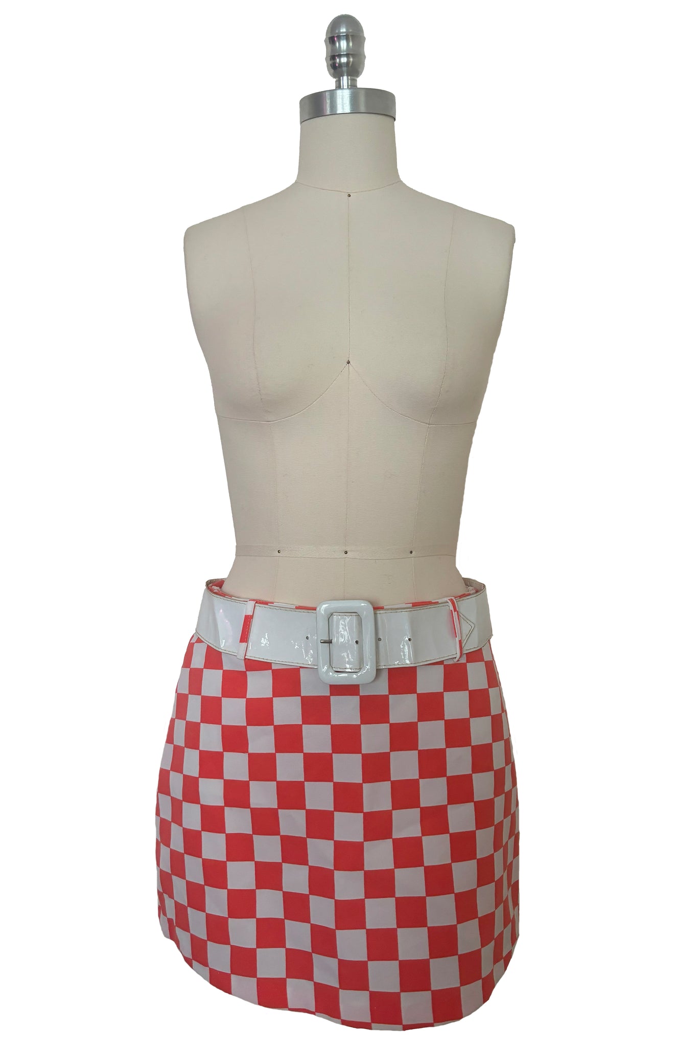 Front view of 1990s does 1960s vintage Mod orange and white checkered micro mini skirt with white belt by Gozzi, small to medium.