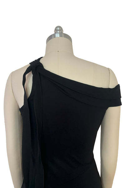 Bodice back view of 2000s vintage y2k Derek Lam 10 Crosby black knit one shoulder asymmetrical dress with gold buttons, size small to medium. Showing the off the shoulder design with asymmetrical neckline.