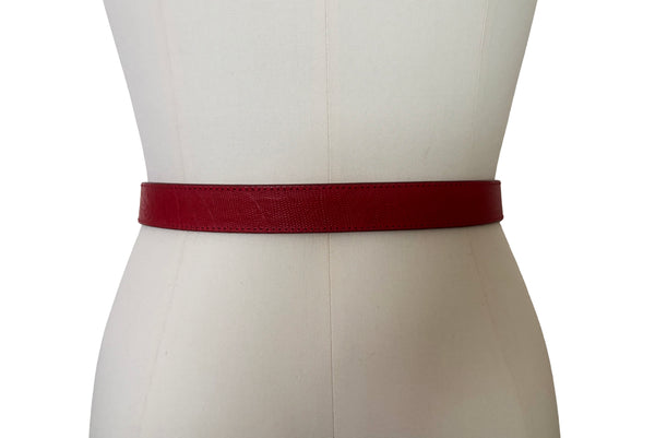 Back view of 1980s vintage designer red stamped Italian leather belt  with brass buckle by Furla, size medium to large. Made in Italy.
