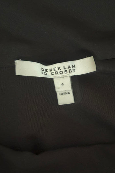 Interior detail view of 2000s vintage y2k Derek Lam 10 Crosby black knit one shoulder asymmetrical dress with gold buttons, size small to medium. Showing the Derek Lam 10 Crosby label and size 6 tag.