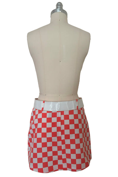 Back view of 1990s does 1960s vintage Mod orange and white checkered micro mini skirt with white belt by Gozzi, small to medium.