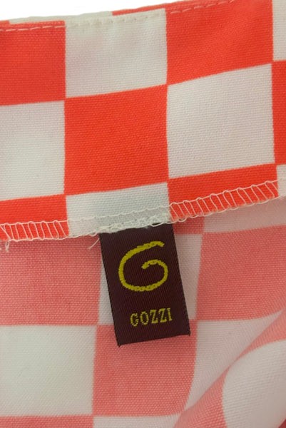 Interior detail view of 1990s does 1960s vintage Mod orange and white checkered micro mini skirt with white belt by Gozzi, small to medium. Showing the Gozzi label.