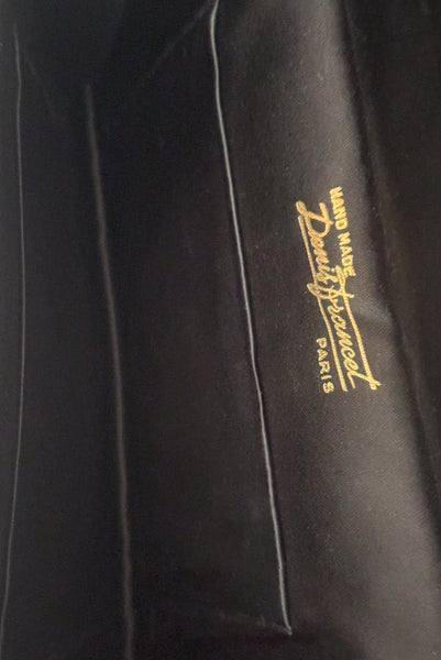 Interior detail view of 1930s vintage black satin clutch with pink, blue, green, purple, and gold floral chainstitch embroidered clutch by Denis Francet. Showing  the black satin lining.