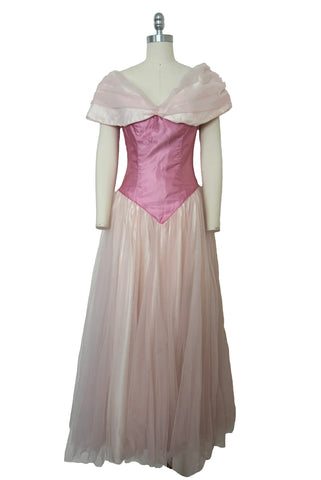 Front view of 1980s vintage pink satin and tulle off the shoulder bridesmaids dress, small to medium. Princess style gown.