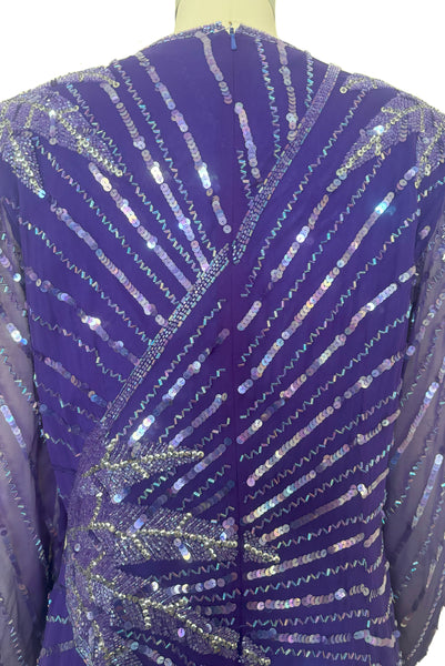 Back top detail view of 1980s vintage beaded purple silk & rayon blouse and drop waist dress Set by Nite Line, small to medium. Showing the iridescent purple sequins and glass beading, and the missing line of beading.