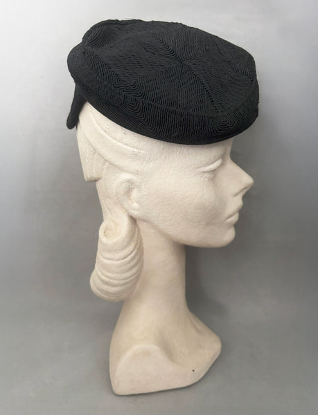 Side view of 1940s vintage black diamond checkboard cordé tilt topper hat.