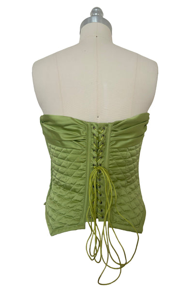 Back view of 1990s vintage peridot green quilted satin corset/bustier by John Festa, small to medium. New without tags.