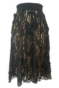 Front view of 1990s vintage goth sheer black lace and taffeta nude look skirt, medium to large.