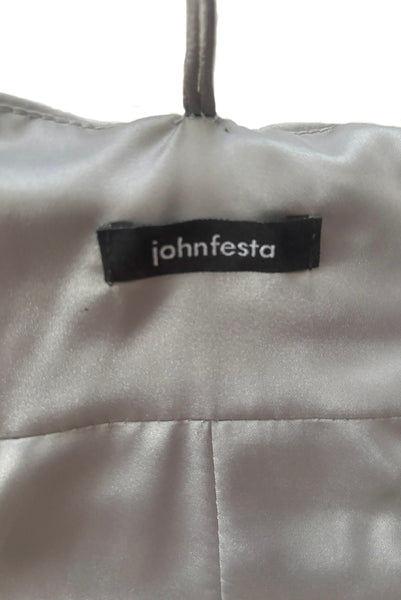 Interior detail view of 1990s vintage silver gray quilted satin corset/bustier by John Festa, medium to large. New with tags. Showing the John Festa label.