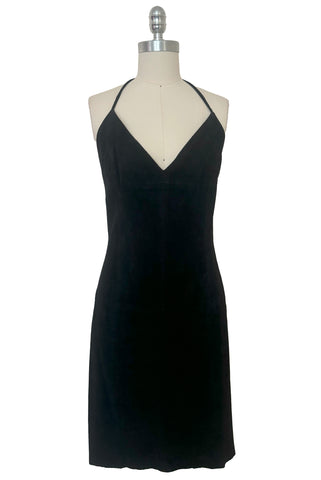 Front view of vintage 1990s black perforated suede leather mini dress by Parallel, small to medium. Showing the sweetheart neckline, empire waist, and a-line skirt.
