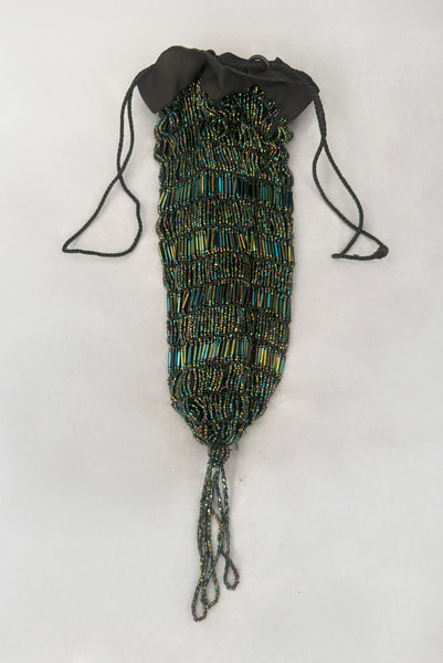 Vertical view of 1910s turn of the century vintage Edwardian black peacock iridescent glass beaded drawstring handbag.