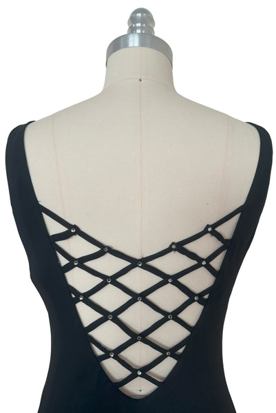 Back detail view of 1990s black slip dress with rhinestone lattice back dress by Niki, extra small to small. Showing the open back and round prong set rhinestones.
