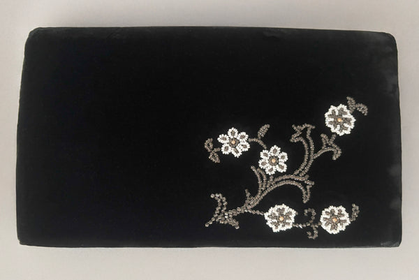 Horizontal back view of 1950s vintage black velvet floral silver and white glass and faux cream pearl beaded clutch evening bag.