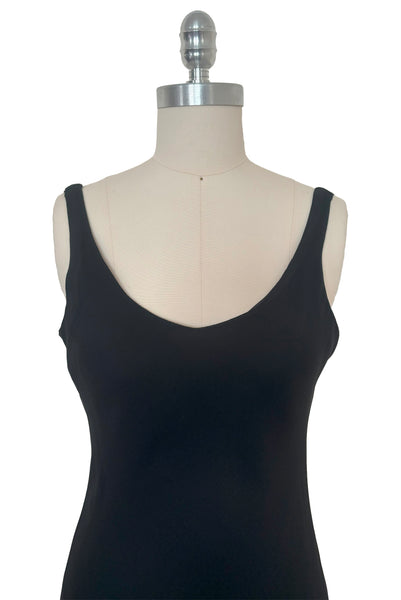 Bodice of 1990s black slip dress with rhinestone lattice back dress by Niki, extra small to small. Showing the sleeveless bodice and wide v-neckline.