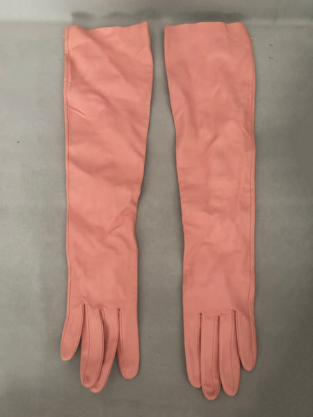 Vertical front view of 2000s y2k vintage pink leather unlined opera gloves with snap wrists, by J.Crew, size L.