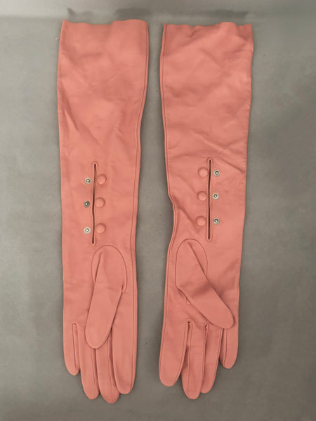 Vertical back view of 2000s y2k vintage pink leather unlined opera gloves with snap wrists, by J.Crew, size L.