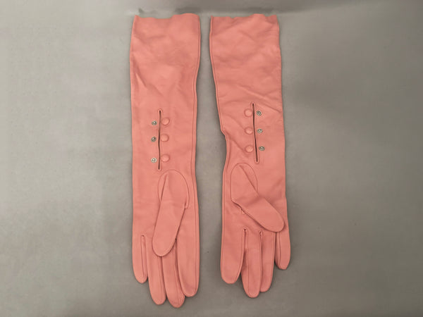 Horizontal back view of 2000s y2k vintage pink leather unlined opera gloves with snap wrists, by J.Crew, size L.