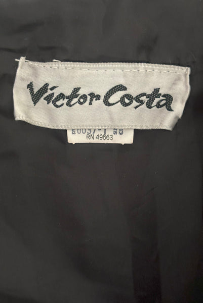 Interior detail view of 1990s vintage Victor Costa black and white poly cotton twill wrapped strapless cocktail dress, extra small to small. Showing the Victor Costa label.