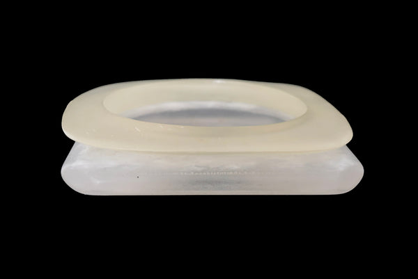 Horizontal front view of 1980s vintage white matte frosted translucent marbled Lucite square bangle bracelet set of two (2).