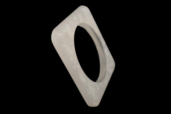 Horizontal square single bangle perspective view of 1980s vintage white matte frosted translucent marbled Lucite square bangle bracelet set of two (2).