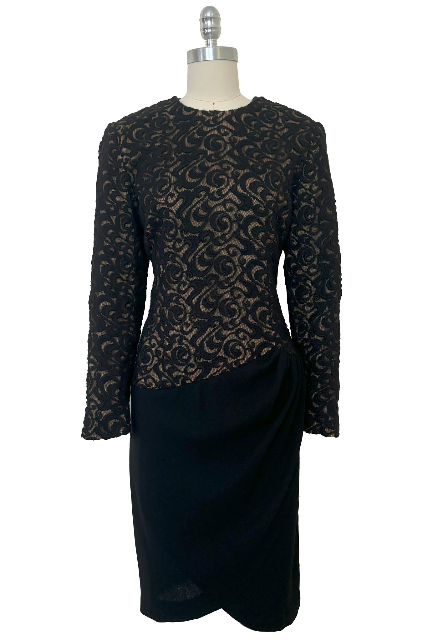 Front view of 1990s vintage Balmain Ivoire long sleeve nude look black wool lace cocktail dress with draped wool crepe skirt, small to medium.