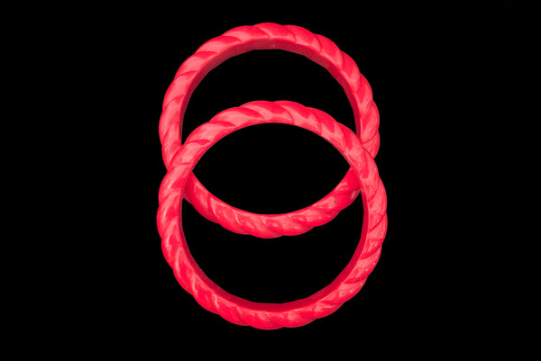 Horizontal top view of 1980s vintage red rope plastic bangle bracelet set of two (2).