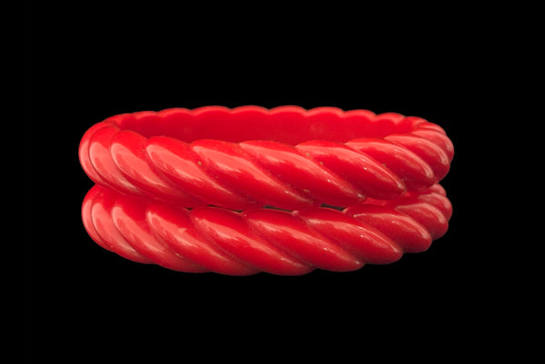 Horizontal front view of 1980s vintage red rope plastic bangle bracelet set of two (2).