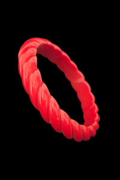 Vertical perspective single view of 1980s vintage red rope plastic bangle bracelet set of two (2).