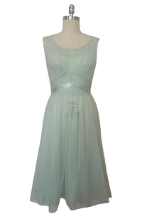 Front view of 1940s vintage pale aqua blue lace, nylon, and satin ribbon ballerina nightgown by Vanity Fair, small to medium.