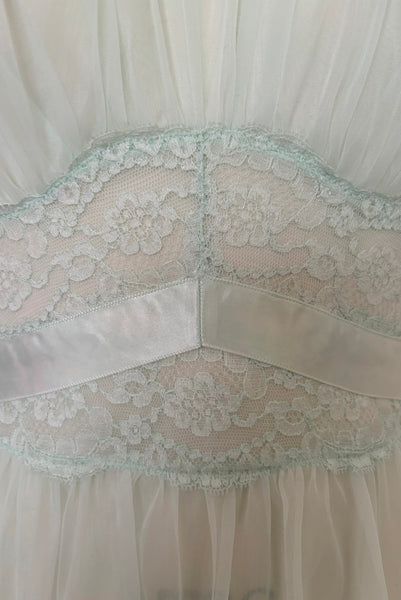 Bodice detail view of 1940s vintage pale aqua blue lace, nylon, and satin ribbon ballerina nightgown by Vanity Fair, small to medium. Showing the lace and ribbon midriff.