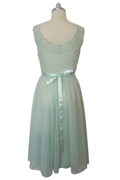 Back view of 1940s vintage pale aqua blue lace, nylon, and satin ribbon ballerina nightgown by Vanity Fair, small to medium.