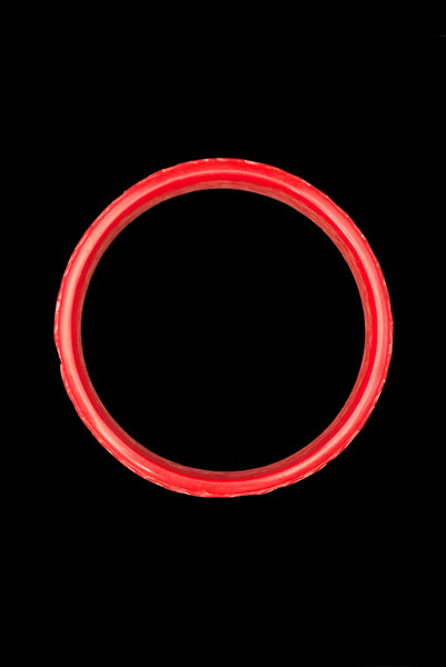 Vertical top view of 1950s vintage red cinnabar scroll carved lacquered Asian bangle bracelet.