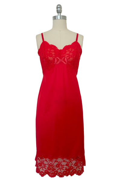 Front view of 1950s vintage crimson red nylon and lace full slip by Van Raalte, small to medium.