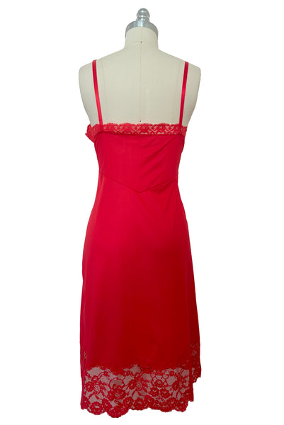 Back view of 1950s vintage crimson red nylon and lace full slip by Van Raalte, small to medium.