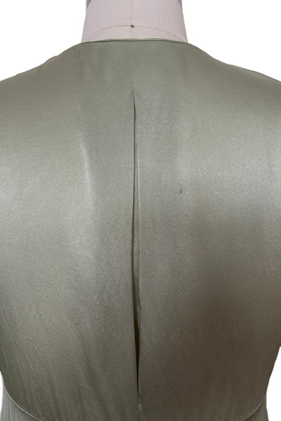 Detail view of 2000s y2k vintage new with tags sage green silk charmeuse robe by Patricia Fieldwalker, size medium to large. Showing the pleat at the center back.