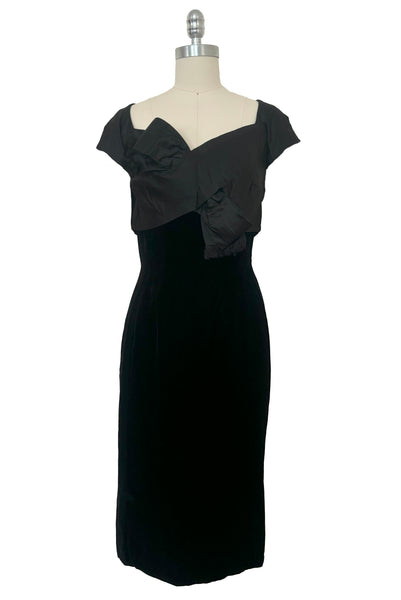 Front view of 1950s vintage black silk satin and velvet wiggle cocktail dress, by Nathan Strong, extra small to small.