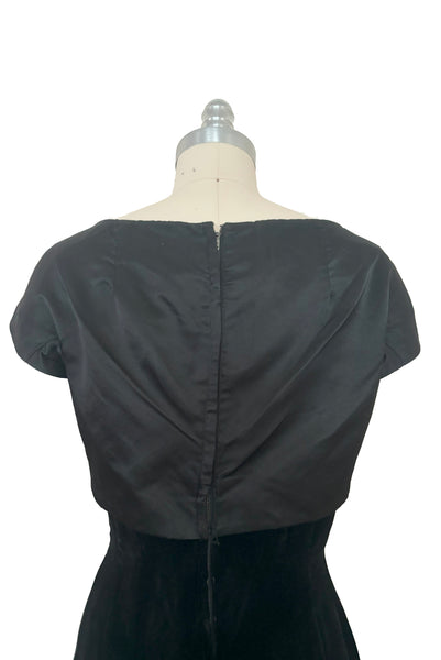 Bodice back view of 1950s vintage black silk satin and velvet wiggle cocktail dress, by Nathan Strong, extra small to small.
