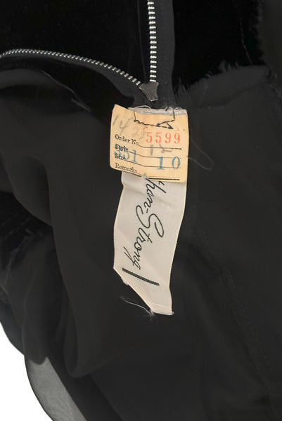 Interior detail view of 1950s vintage black silk satin and velvet wiggle cocktail dress, by Nathan Strong, extra small to small. Showing the  Nathan-Strong label.