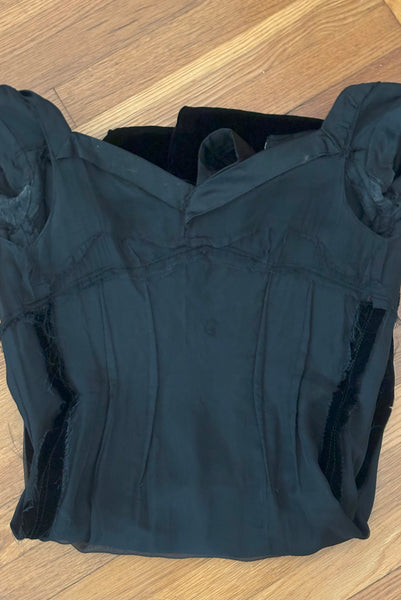 Interior detail view of 1950s vintage black silk satin and velvet wiggle cocktail dress, by Nathan Strong, extra small to small. Showing the  construction detail and organza underlining.