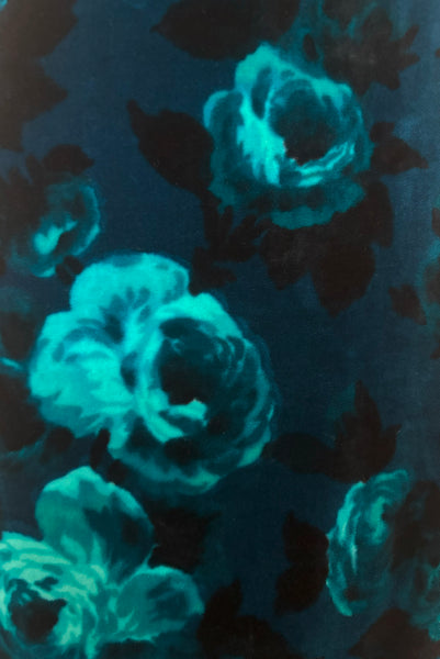 Detail view of 1950s vintage teal and turquoise blue floral velvet dress and jacket set by Lillie Rubin, size extra small to small. Showing a close-up of the blue rose print velvet. 