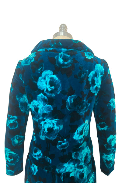 Jacket back view of 1950s vintage teal and turquoise blue floral velvet dress and jacket set by Lillie Rubin, size extra small to small. Showing the standing collar, long sleeves, and slim pencil silhouette.