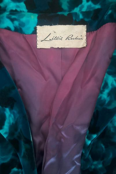 Interior detail view of 1950s vintage teal and turquoise blue floral velvet dress and jacket set by Lillie Rubin, size extra small to small. Showing fading to the blue satin lining of the jacket and Lillie Rubin label.