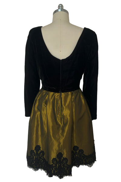 Back view of 1990s vintage black velvet and olive green taffeta cocktail dress by Rimini, size medium to large.