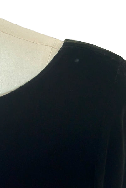 Detail view of 1990s vintage black velvet and olive green taffeta cocktail dress by Rimini, size medium to large. Showing a bare spot in the velvet on the shoulder.
