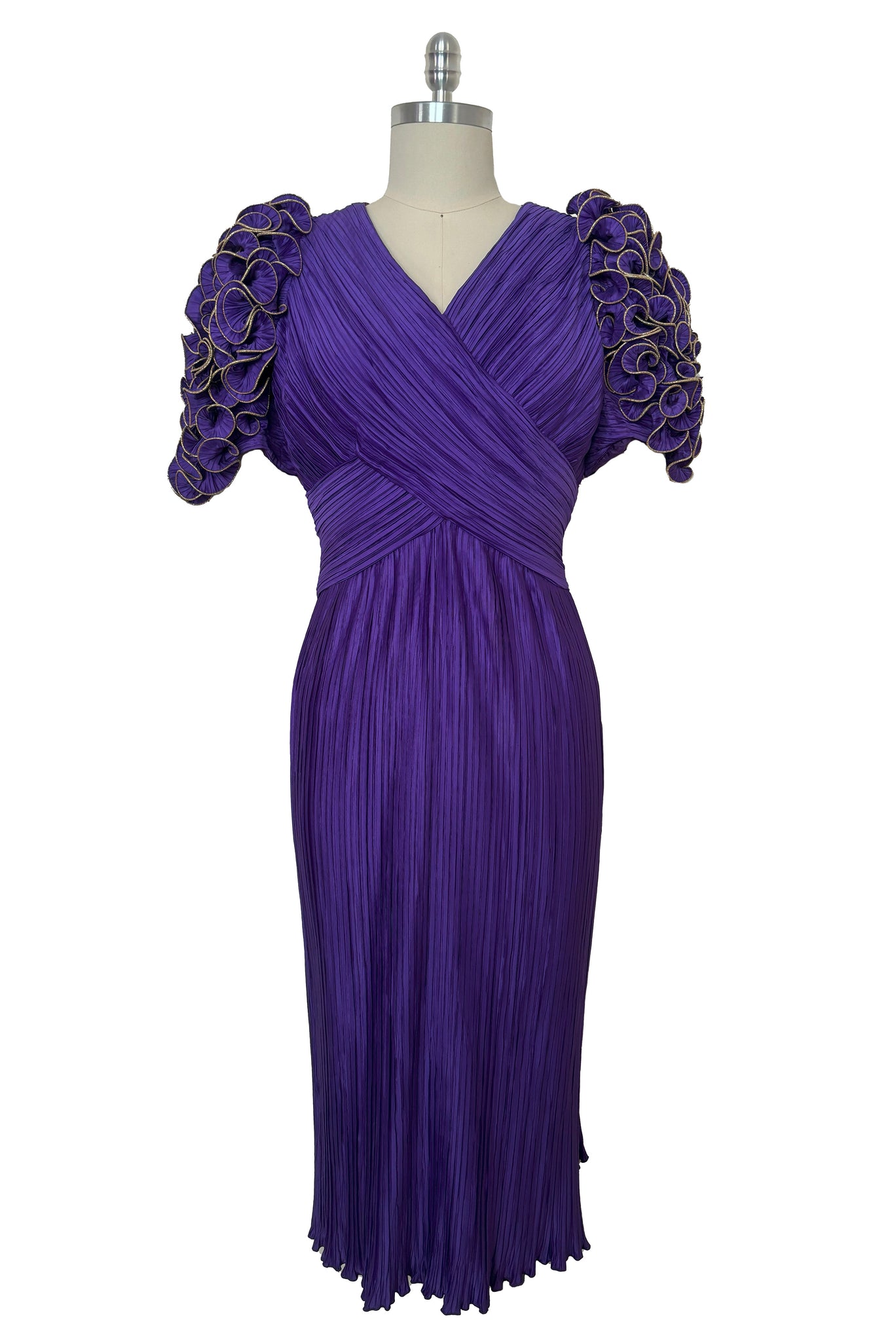 Front view of 1980s vintage purple peated satin dress with purple and gold ruffled statement sleeves by Richilene, size medium to large.